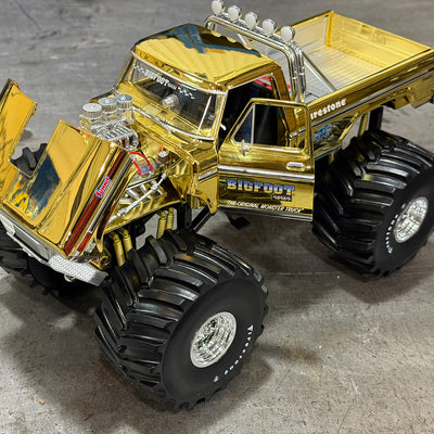 NOT A TOY - Gold Chrome 50th Anniv. 1:18 Greenlight Col. BIGFOOT #1 Die-Cast W/ Figurine