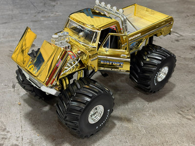 NOT A TOY - Gold Chrome 50th Anniv. 1:18 Greenlight Col. BIGFOOT #1 Die-Cast W/ Figurine