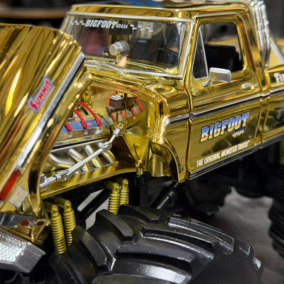 NOT A TOY - Gold Chrome 50th Anniv. 1:18 Greenlight Col. BIGFOOT #1 Die-Cast W/ Figurine